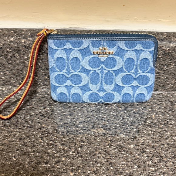 Coach Handbags - Coach Denim Blue Wristlet with Signature Pattern